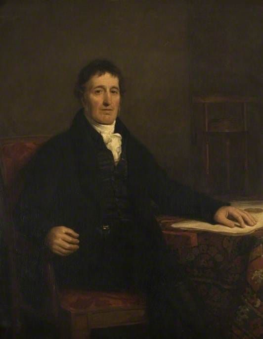 Portrait painting of William Murdoch, 1754 to 1839, seated beside a table.